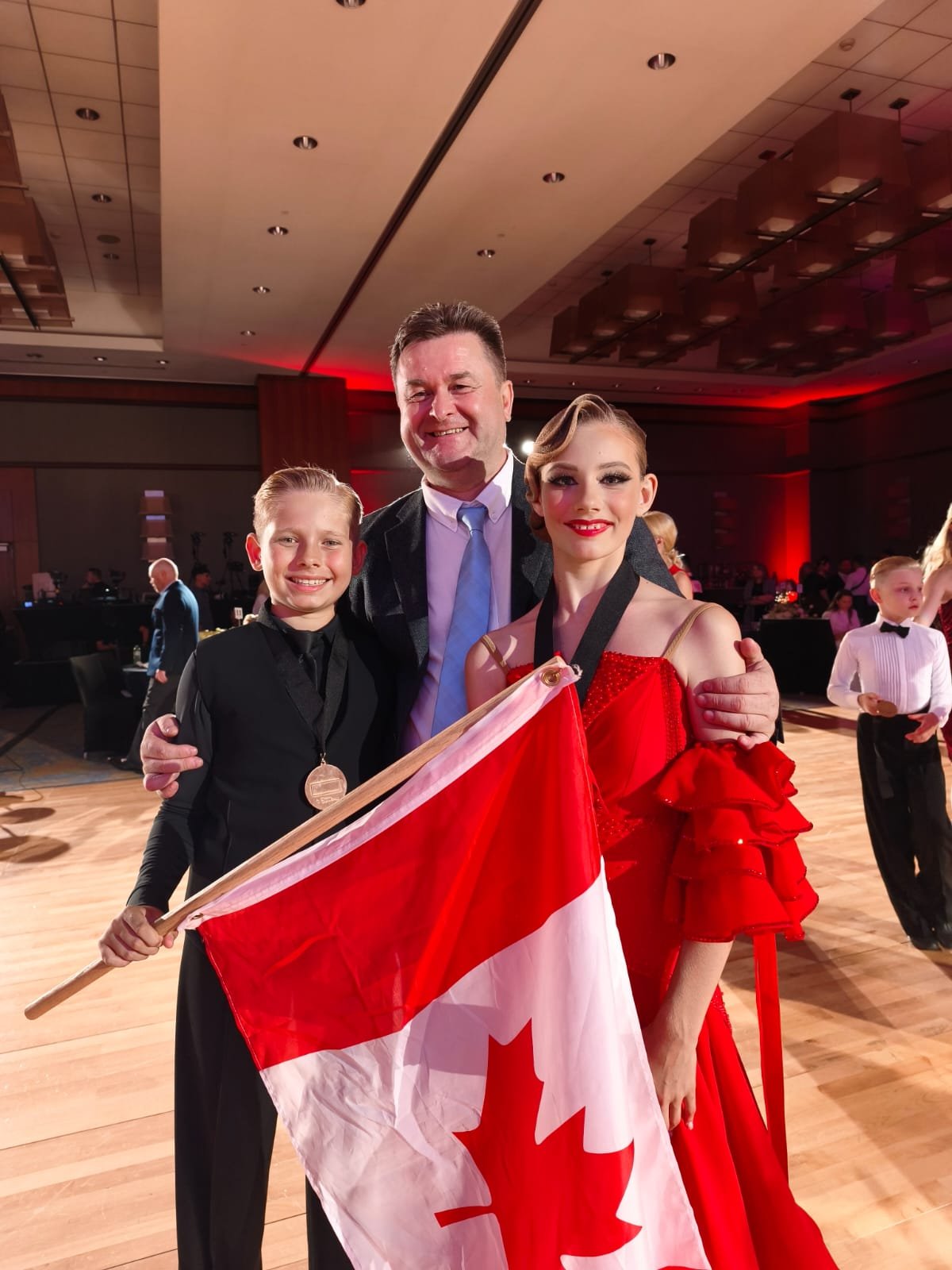 Universe DanceArt dancers with Canadian flag